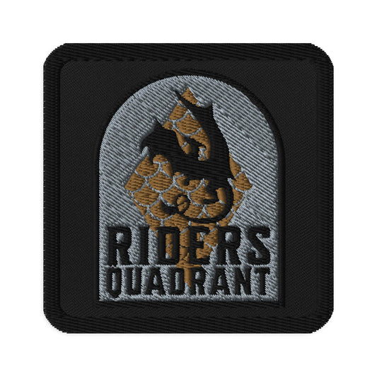 Embroidered patch featuring a dragon with 'Riders Quadrant' text, ideal for bookish merchandise fans.