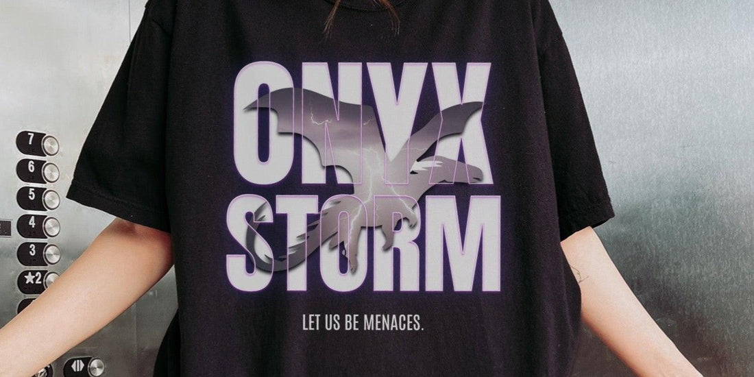 Person wearing black Onyx Storm t-shirt with a dragon silhouette and book quote in elevator
