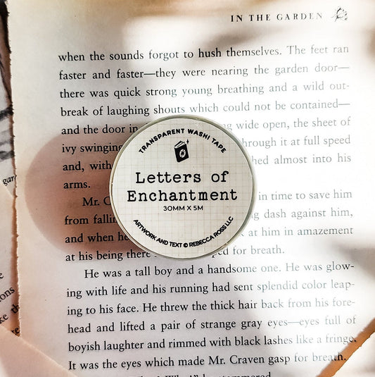 Letters of Enchantment washi tape on open book pages, bookish stationery for readers