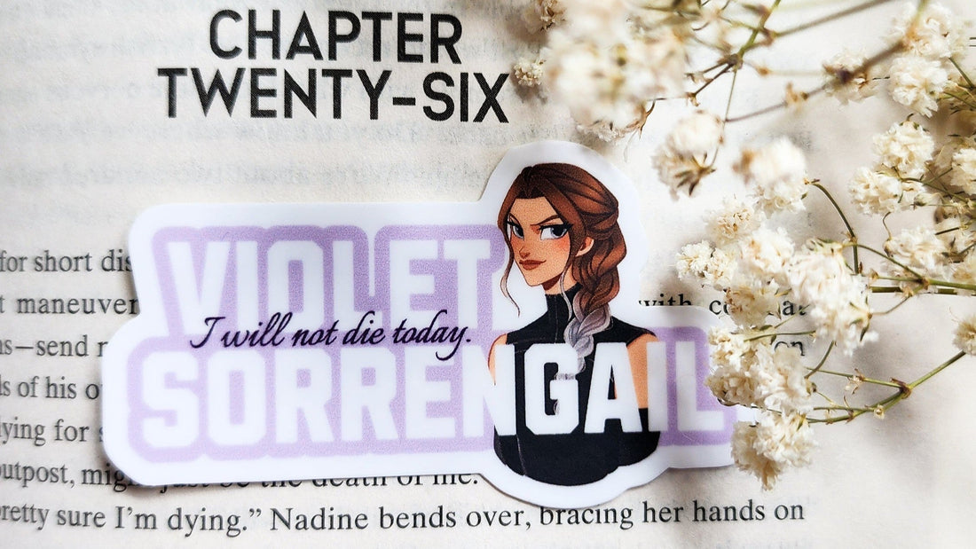 Violet Sorrengail bookish sticker with character art and quote on open book with flowers