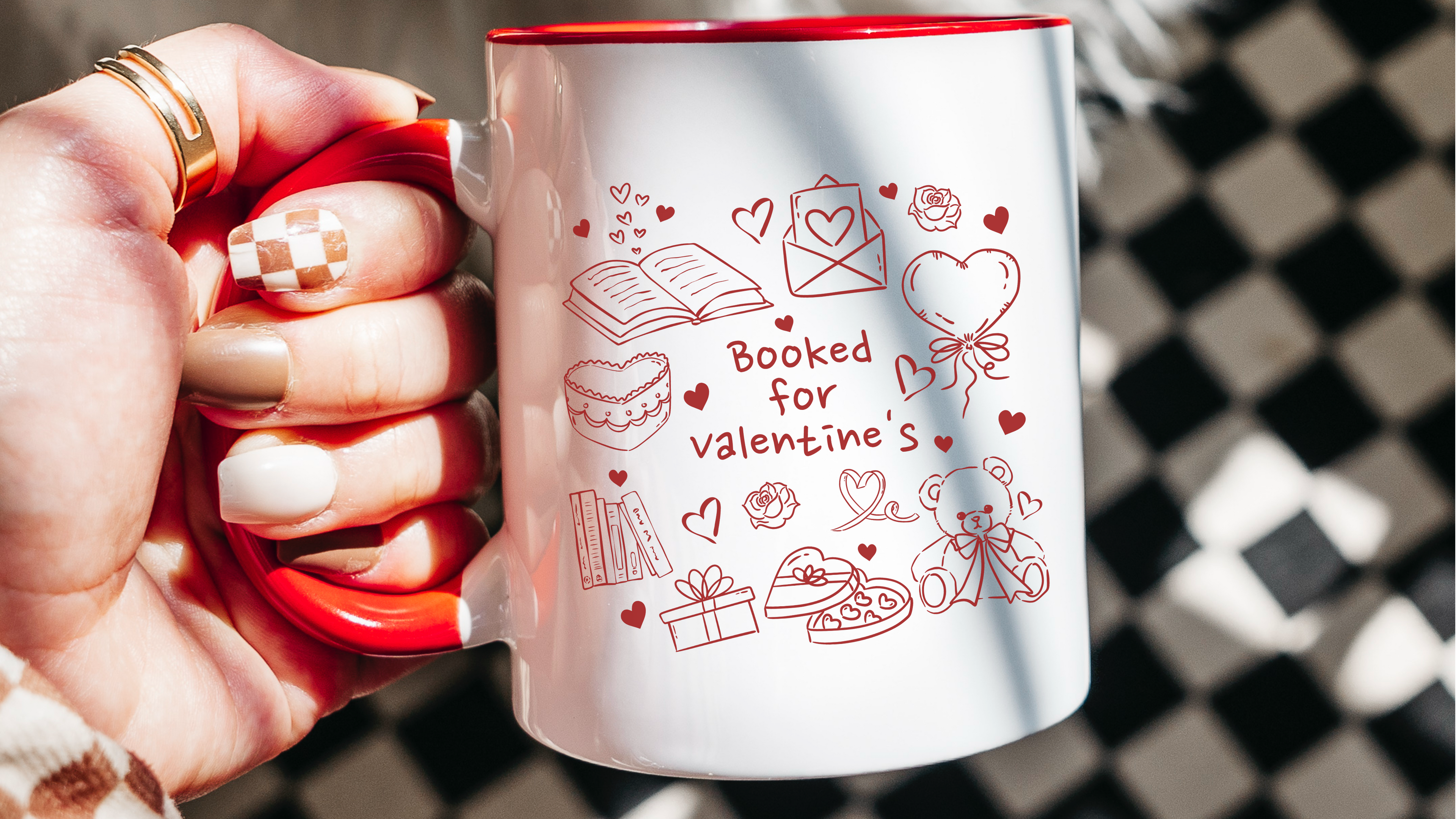 White mug with red rim featuring 'Booked for valentine's' and romantic bookish illustrations