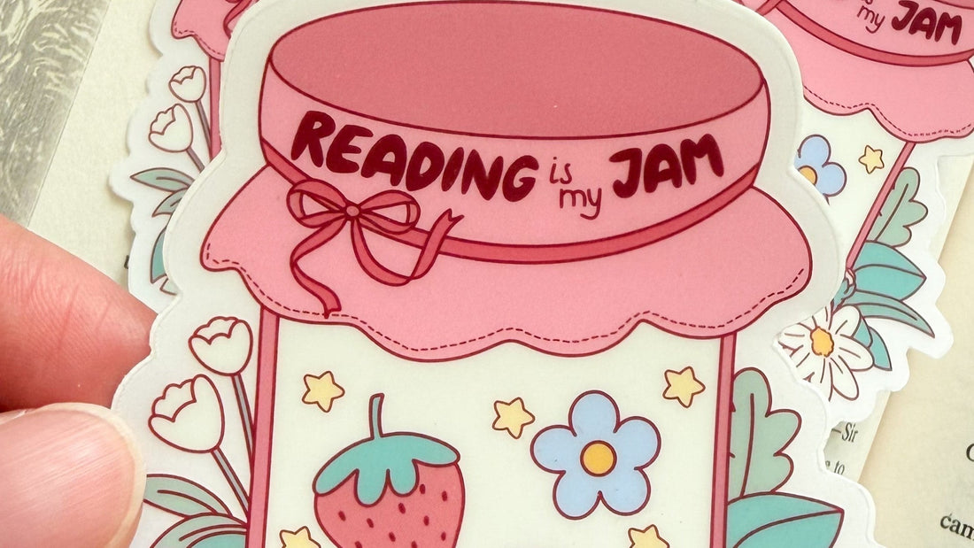 Cute pink jam jar sticker with 'Reading is my Jam' text, flowers, and strawberry design for book lovers.