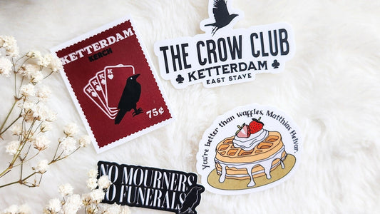 Six of Crows inspired stickers featuring Ketterdam designs, crow, waffles, and bookish quotes