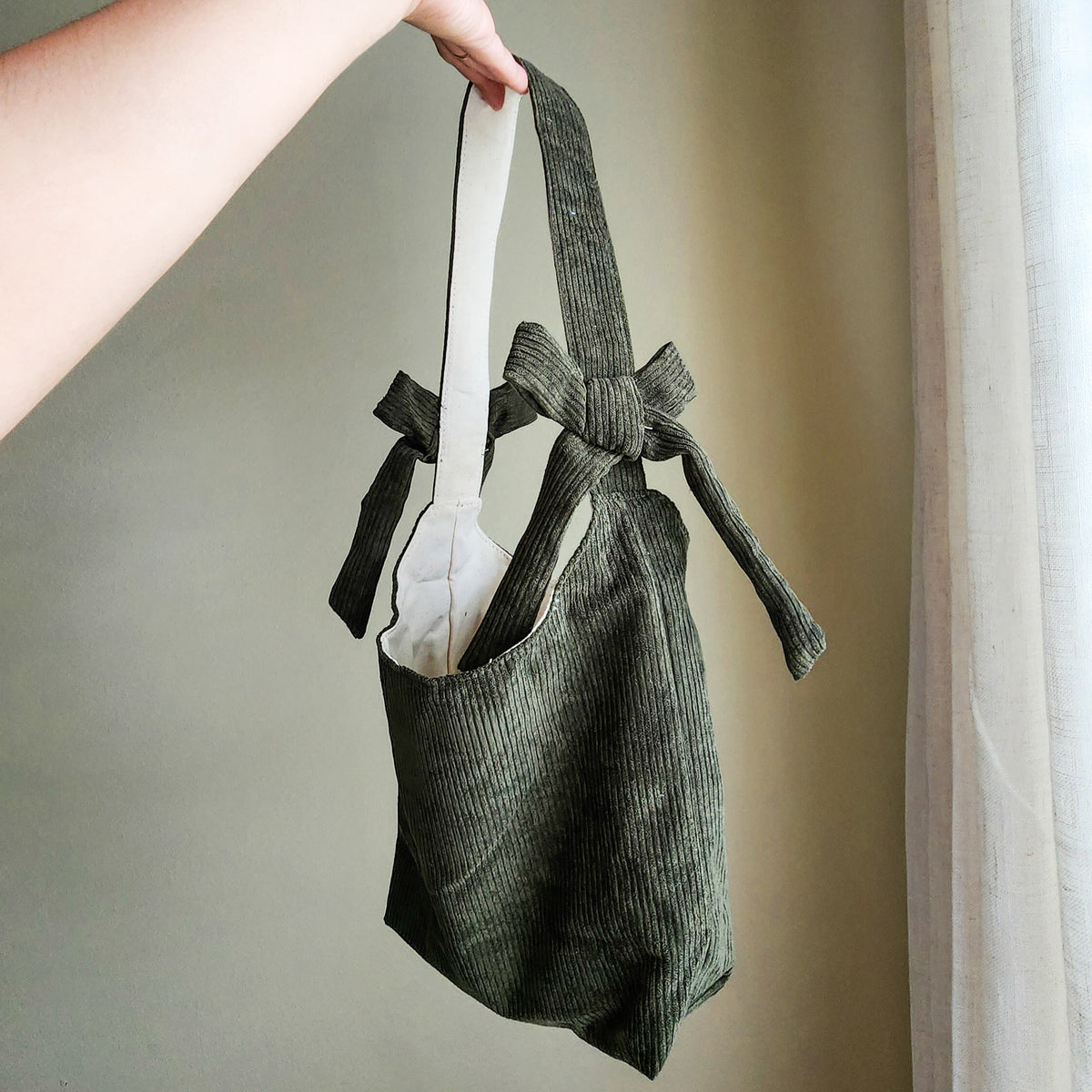 Booked and Busy Corduroy Bow Tote Bag - The Bean Workshop - book club, book lover, book lovers, bookaholic, booked and busy, bookish, bookish friends, Booklice, Books and girls, bookstore, bookstore date, booktrovert, bow tote, corduroy tote, fantasy readers book club, gift for book lovers, tote, tote bag
