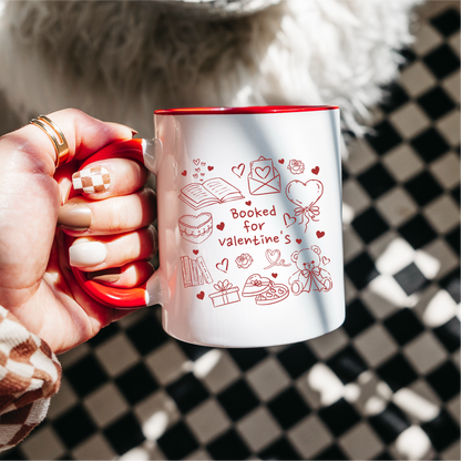 Hand holding white mug with red handle, 'Booked for valentine's' bookish doodles, Valentine's gift