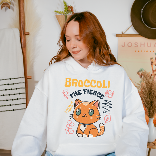 Broccoli the Fierce Hoodie - The Bean Workshop - Basgiath War College, Book Lover Gift, Bookish Cat, Booktok, Broccoli the Fierce, Chibi Art, Cute Romantasy, Dragon Rider, Empyrean Series, Fantasy Reader., Fourth Wing Merch, hoodie, Iron Flame Merch, Kawaii, Liam Mairi, Quest Squad Mascot, Rebecca Yarros, Violet Sorrengail, Xaden Riorson