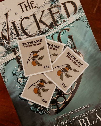 Book titled 'The Wicked' by Holly Black with Elfhame stickers on a wooden surface