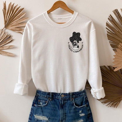 Feral Librarian Raised by Booklice Sweatshirt - The Bean Workshop - margaret rogerson, sorcery of thorns, sweatshirt