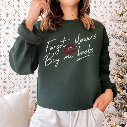 Woman wearing green sweatshirt with 'Forget flowers, buy me books' text and red lips graphic