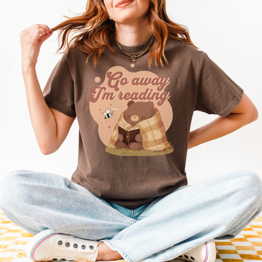 Go Away I'm Reading T-Shirt - The Bean Workshop - Book T-Shirt, Cozy Aesthetic, Cute Bear, Cute Bear Reading Graphic T-Shirt, Everyday Wear, fall, Funny Introvert Book Lover Tee, Funny Quote, Gift for Readers, Go Away I'm Reading Shirt, Graphic Tee, Introvert Humor., Reading Shirt, Retro Bookish