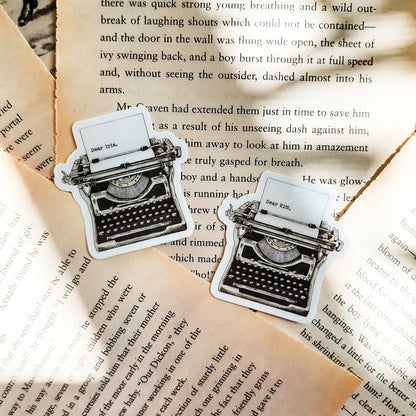 Iris Winnow Allouette Typewriter Sticker | Divine Rivals Rebecca Ross - The Bean Workshop - bookish gift, bookish sticker, Divine Rivals, Divine Rivals merch, fantasy romance, gift for book lovers, Iris and Roman, Iris Winnow, journal sticker, laptop sticker, Letters of Enchantment, Rebecca Ross, Rebecca Ross merch, Ruthless Vows, sticker, typewriter sticker