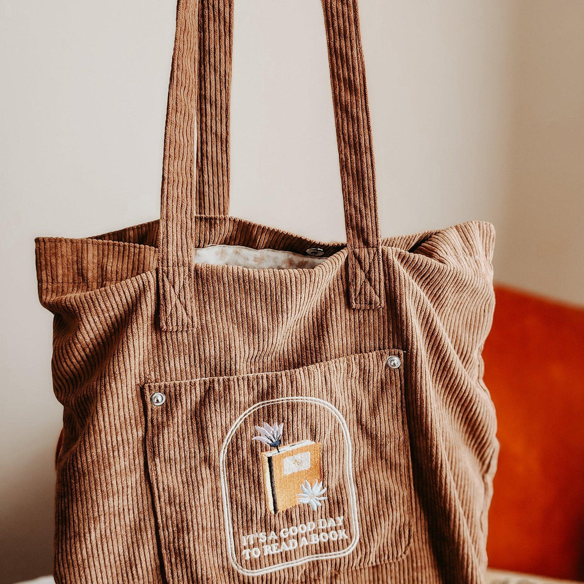 It's A Good Day To Read A Book Embroidered Corduroy Tote Bag - The Bean Workshop - bibliophile gift, book club, book girlie, book lover, book lovers, book tote, bookaholic, bookish, bookish friends, bookstore, bookstore date, booktrovert, corduroy tote bag, embroidered tote bag, gift for readers, tote, tote bag