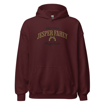 Jesper Fahey Embroidered Hoodie - The Bean Workshop - Bookworm Hoodie, Fandom Apparel, Grishaverse gift, Gunslinger Style, Jesper Fahey embroidered hoodie, leigh bardugo, Leigh Bardugo bookish hoodie for readers, Literary Streetwear, Revolver Design, Sharpshooter fan merchandise, Six of Crows hooded sweatshirt, The Dregs apparel, Wesper