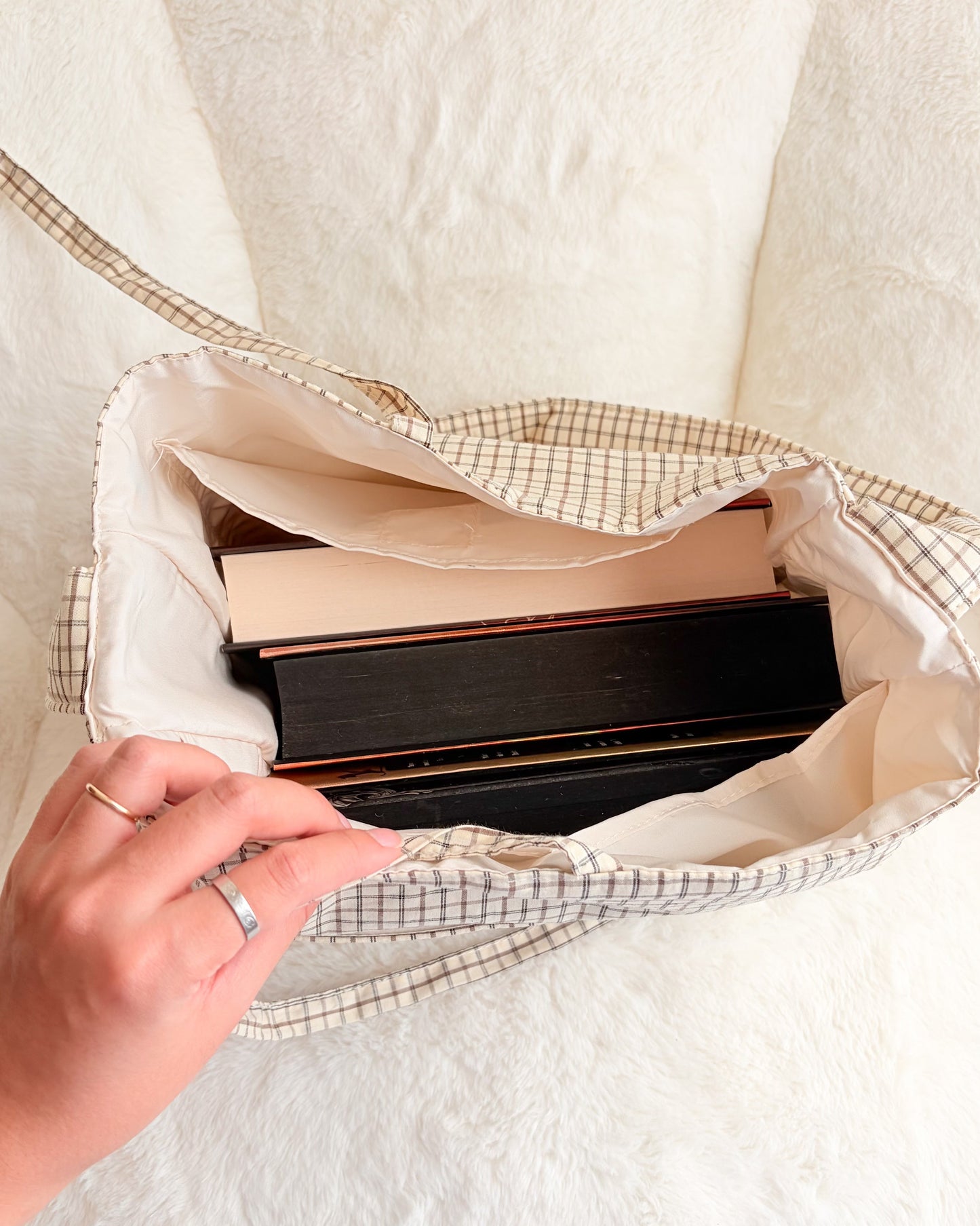 Large gingham book tote bag with books inside and multiple pockets, canvas reading tote