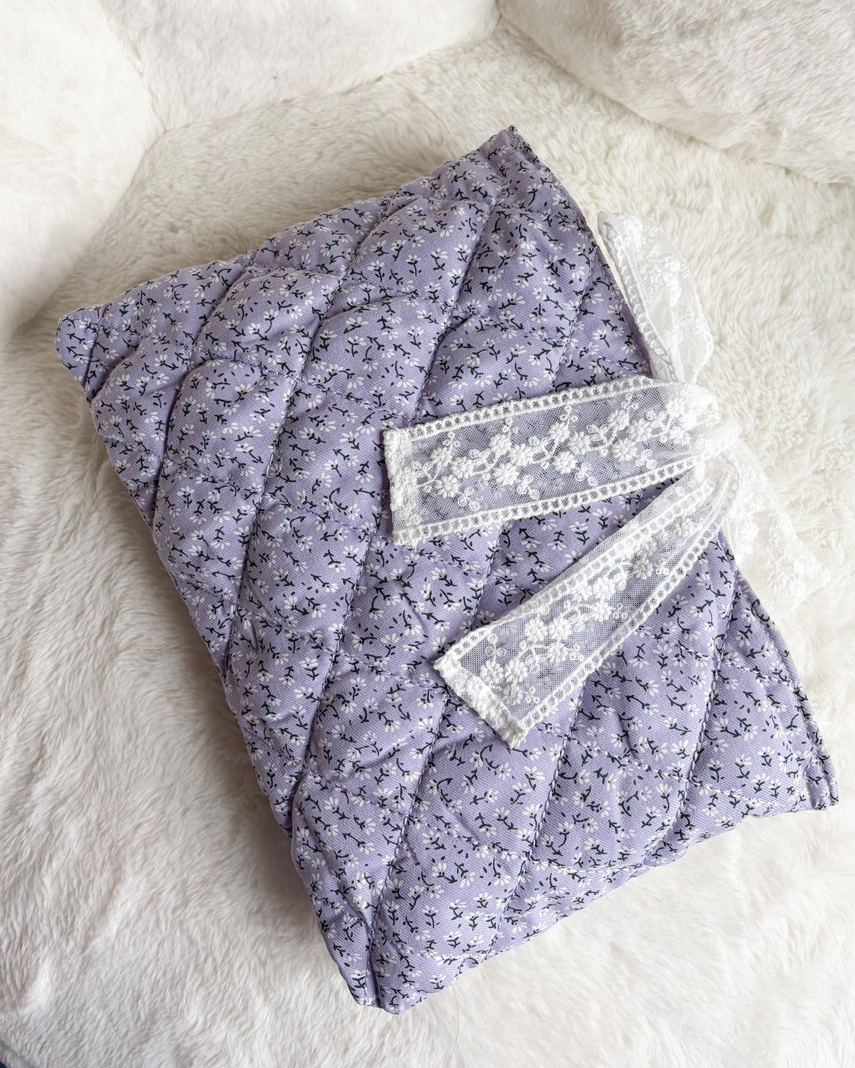 Lavender Quilted Book Sleeve with Lace Ribbon | Bible, Hardcover & Laptop Sleeve - The Bean Workshop - Bible cover, Bible sleeve, book girlie, book sleeve, bookish, bookish gifts, Christian gifts, church bag, coquette, cottagecore, dreamy, floral, floral book sleeve, flower, gift for book lovers, gift for women, girl summer, lace, lavender, lavender book sleeve, purple, quilted, reading accessories, soft girl, study Bible cover, study Bible sleeve