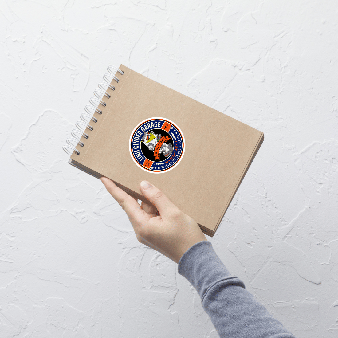 Linh Cinder Garage Sticker - The Bean Workshop - book lover gift, Bookish Accesories, Bookish Gift, bookish sticker, Cinder, die cut sticker, Iko, Linh Cinder, Linh Cinder Garage, Marissa Meyer, Marissa Meyer merch, sci-fi fairy tale, Sticker, The Lunar Chronicles, The Lunar Chronicles merch