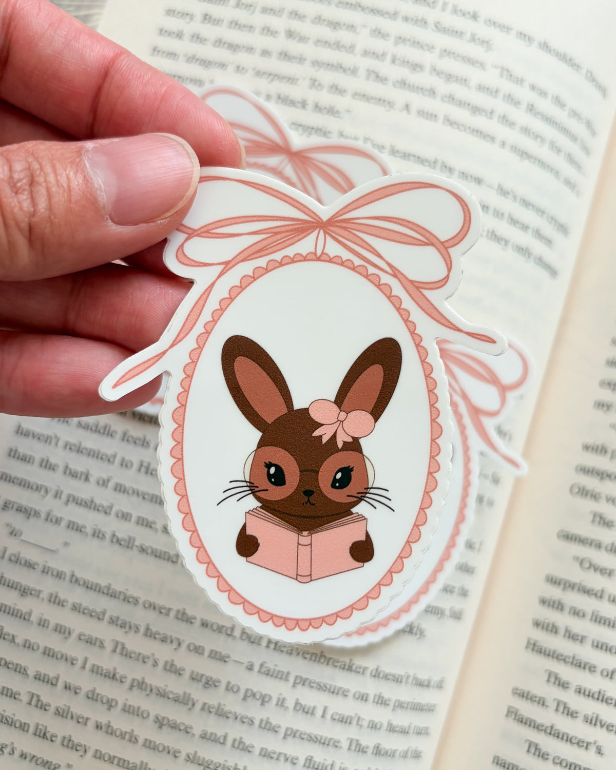 Little Rabbit Reading Her Book Sticker - The Bean Workshop - book lover gift, book lover sticker, book trope, Bookish Gift, bookish sticker, bunny sticker, coquette sticker, cottagecore sticker, cute sticker, die cut sticker, reader sticker, sticker, vinyl sticker