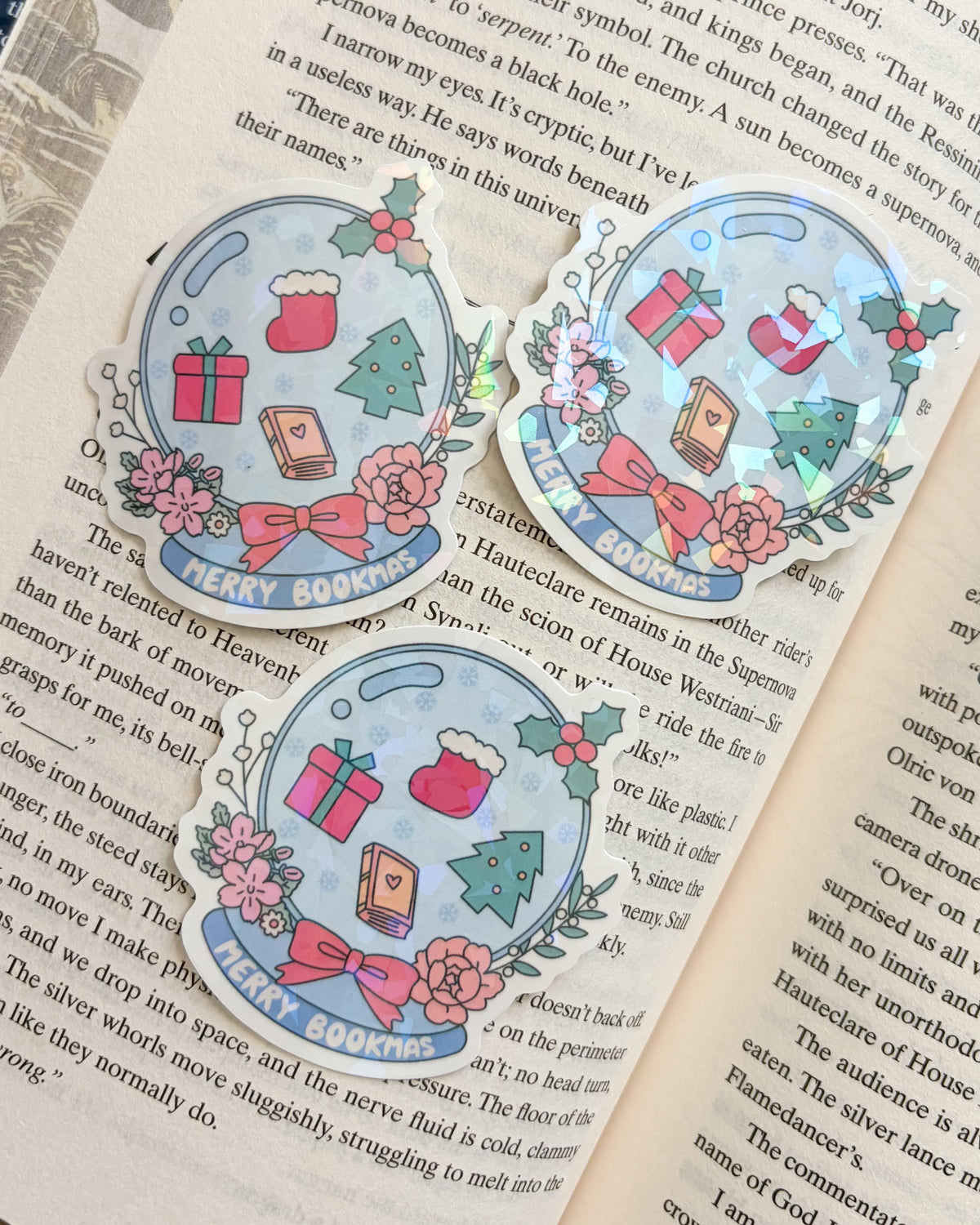 Merry Bookmas Snow Globe Holographic Sticker - The Bean Workshop - book lover gift, Bookish Christmas, bookish gift, bookish sticker, Bookworm Christmas, christmas, Christmas Gift, Christmas sticker, die cut sticker, holiday sticker, holographic sticker, reader gift, Secret Santa gift, sticker, vinyl sticker