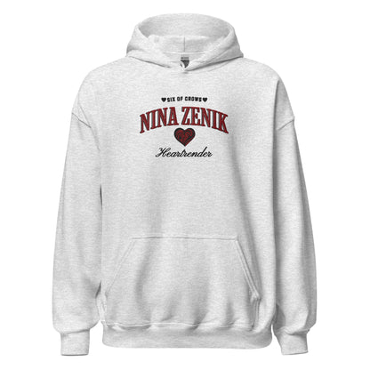 Nina Zenik Embroidered Hoodie - The Bean Workshop - Bookworm Hoodie, Fandom Apparel, Fantasy Character, Grisha Power, Grishaverse gift, Heart Design, Heartrender fan merchandise, Helnik, Leigh Bardugo fan apparel for readers, Literary Streetwear, Nina Zenik embroidered hoodie, Six of Crows hooded sweatshirt, The Dregs apparel