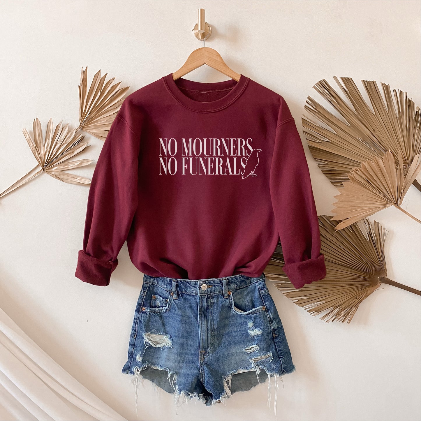 No Mourners No Funerals Sweatshirt - The Bean Workshop - Bookworm Apparel, Cozy sweatshirt for book lovers, Dark Fantasy Aesthetic, Fantasy Reader Gift, Grishaverse, Kaz Brekker quote merch for readers, Ketterdam Crew, Leigh Bardugo bookish apparel, Literary Gift, Minimalist Design, No Mourners No Funerals sweater, Six of Crows sweatshirt, The Crows