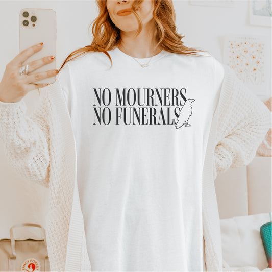 No Mourners No Funerals Tee Shirt - The Bean Workshop - Book lover gift, Bookish Apparel, Dark Fantasy, Fantasy Book Shirt., Kaz Brekker quote tee, Ketterdam, Leigh Bardugo fan merchandise, Literary Quote, Minimalist Aesthetic, No Mourners No Funerals t-shirt, Six of Crows quote shirt for readers, The Crows T-shirt, The Dregs