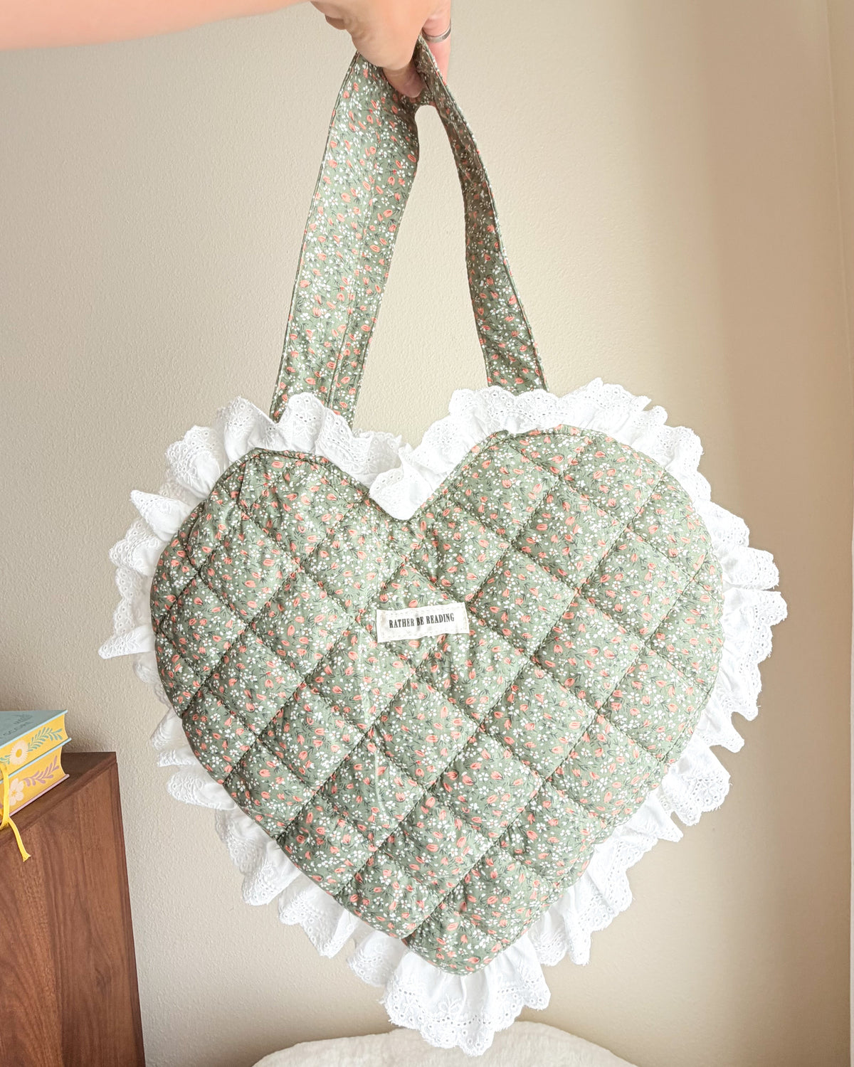 Rather Be Reading Green Quilted Heart Tote Bag with Ruffled Lace Trimming - The Bean Workshop - book girlie, book tote bag, coquette, Coquette Aesthetic, decorative pillow, gift for book lovers, girlie, girly, heart tote, quilted tote, quilted tote bag, reading tote bag, tote bag, valentines gift