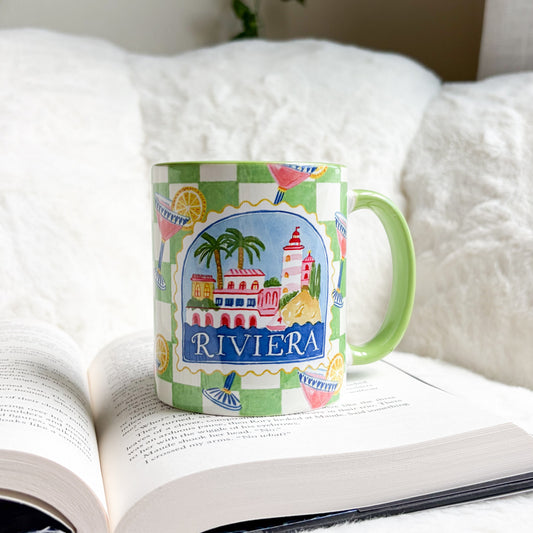 Riviera Green Checkered Ceramic Mug - The Bean Workshop - aesthetic mug, bookish gifts, bookish mug, ceramic mug, checkered mug, coastal grandmother, cocktail illustration, coffee mug, cottagecore, desk accessories, French Riviera, gifts for her, green handle mug, green mug, lighthouse, mug, palm tree, preppy, reader gifts, Riviera mug, tea mug