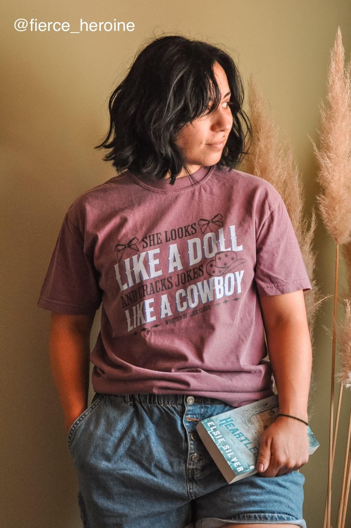 She Looks Like a Doll and Cracks Jokes Like a Cowboy Tee Shirt - The Bean Workshop - box tee, cade eaton, chestnut springs, elsie silver, heartless