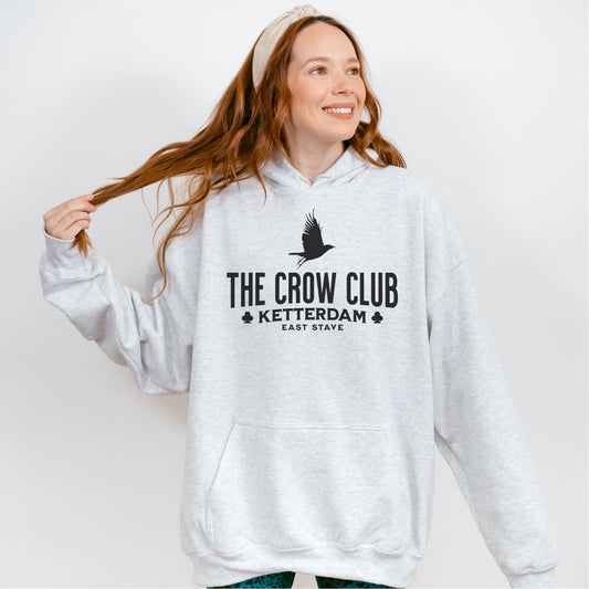 The Crow Club Hoodie - The Bean Workshop - Bookish Hoodie, Bookworm Apparel, Dark Fantasy, East Stave, Fantasy Fan Gift, Grishaverse apparel for readers, Kaz Brekker's crew gift, Ketterdam Merch, Leigh Bardugo bookish apparel, Leigh Bardugo hooded sweatshirt, Literary Streetwear, Six of Crows fan merchandise, The Crow Club hoodie, The Dregs