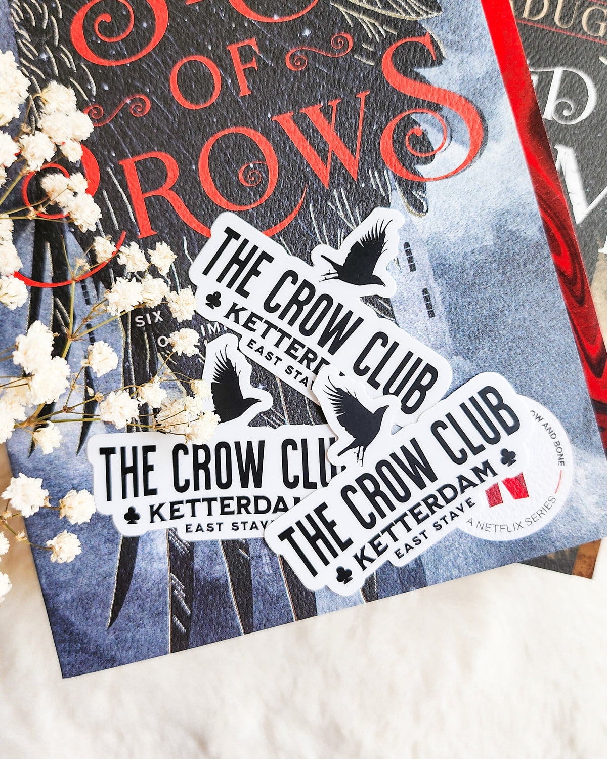 The Crow Club Sticker - The Bean Workshop - book lover gift, Bookish Gift, bookish sticker, Crow Club, die cut sticker, fantasy sticker, Grishaverse, Kaz Brekker, Ketterdam, leigh bardugo, Leigh Bardugo merch, six of crows, Six of Crows merch, sticker