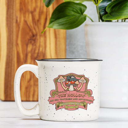 Speckled cream ceramic camp mug with whimsical mushroom and cat illustration, vintage style