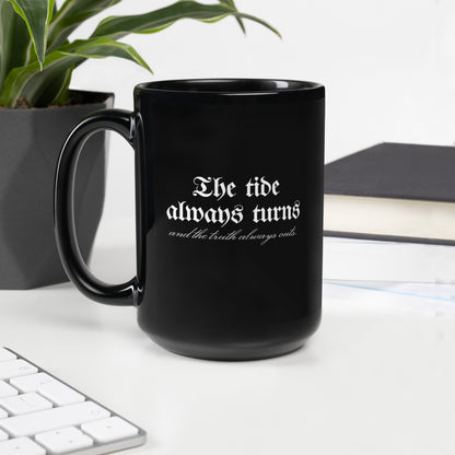 The Tide Always Turns Black Glossy Mug - The Bean Workshop - Black Glossy Mug, Blackletter White on Black Design, Bold Literary Quote Mug, Bookish Mug for Fantasy Readers, Cozy Bookish Aesthetic, Dark Academia Aesthetic, Fantasy Fandom Drinkware, Gift for Book Lovers, Gothic Typography, One Dark Window, Rachel Gillig, Reader Coffee Mug, The Tide Always Turns Black Glossy Mug Fan Gift